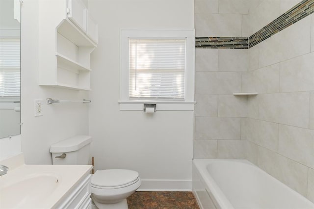 full bathroom with vanity, toilet, and tiled shower / bath combo