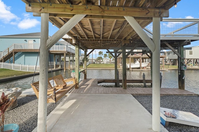 dock area with a water view