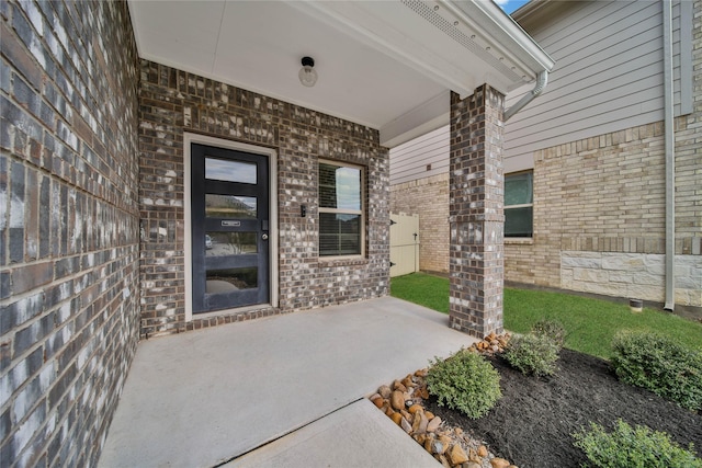 doorway to property featuring a patio