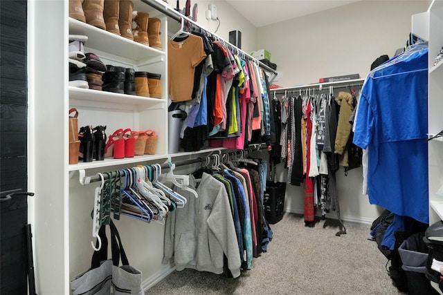 spacious closet featuring carpet floors