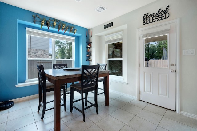 view of tiled dining room