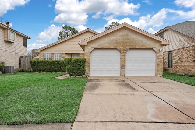 view of front of house with a garage, central air condition unit, and a front lawn