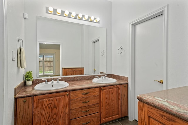 bathroom with vanity and tile patterned floors