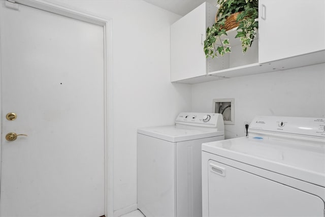 laundry room featuring washing machine and clothes dryer