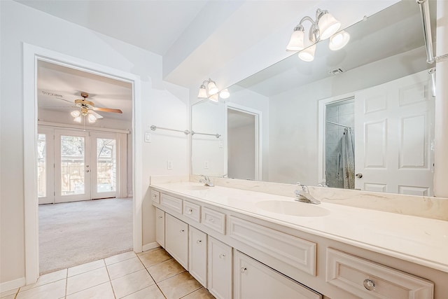 bathroom with vanity, a shower, french doors, tile patterned floors, and ceiling fan with notable chandelier