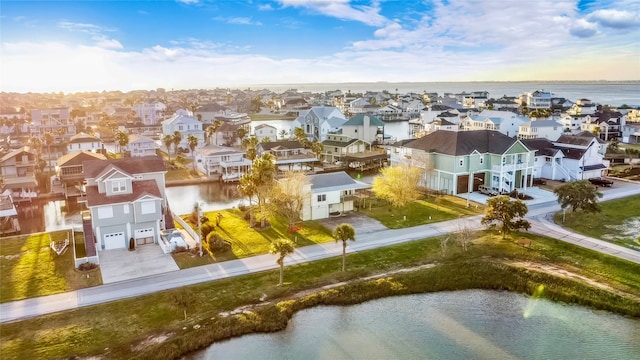 drone / aerial view with a water view