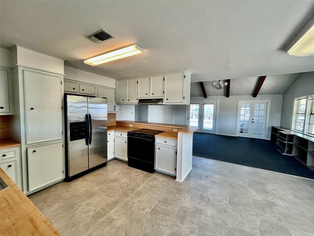 kitchen with light carpet, french doors, lofted ceiling with beams, stainless steel fridge, and black / electric stove