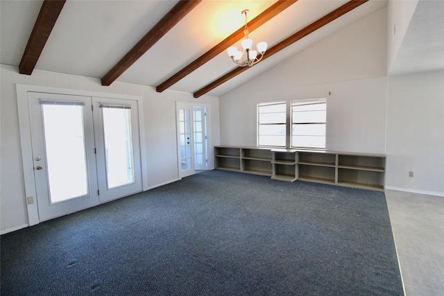 unfurnished room featuring carpet floors, french doors, an inviting chandelier, and lofted ceiling with beams