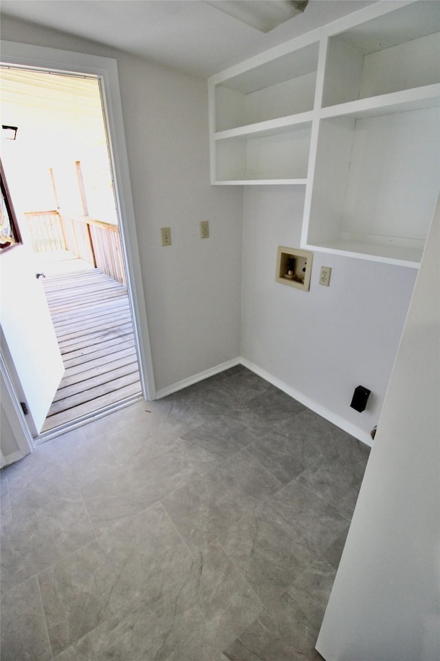 clothes washing area featuring washer hookup