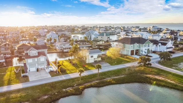 drone / aerial view with a water view