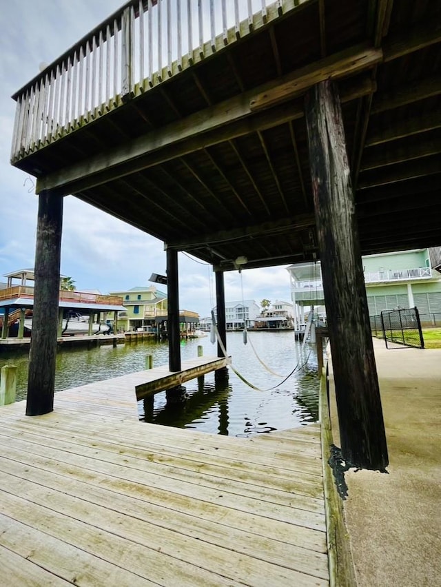 dock area featuring a water view