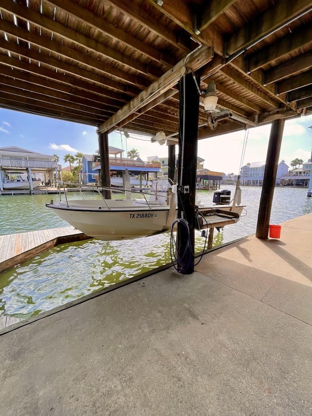 dock area featuring a water view