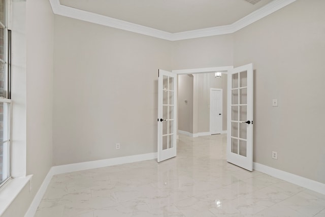 empty room with crown molding and french doors