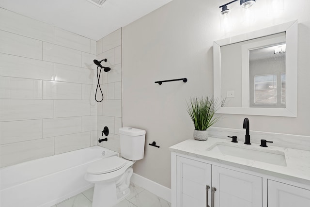 full bathroom featuring toilet, tiled shower / bath, and vanity