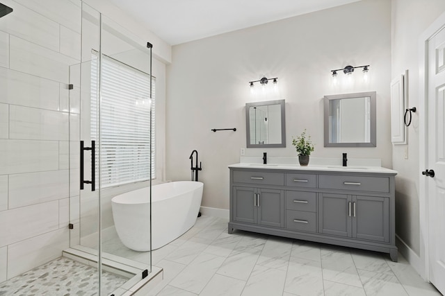 bathroom featuring shower with separate bathtub and vanity