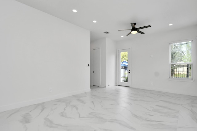 empty room featuring ceiling fan