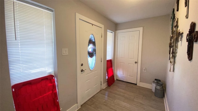 foyer with light wood-type flooring