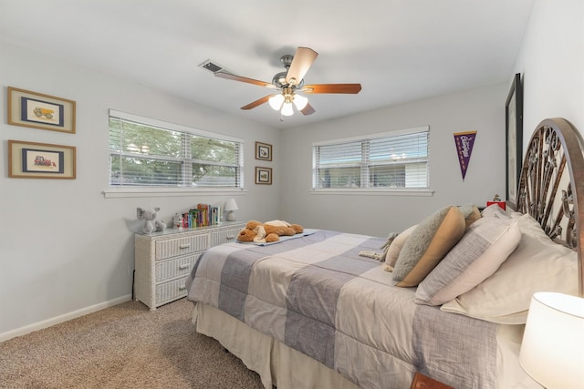 bedroom with ceiling fan and carpet floors