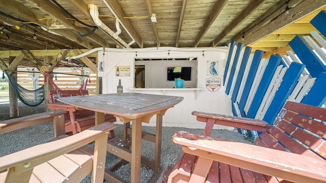 view of patio with an outbuilding