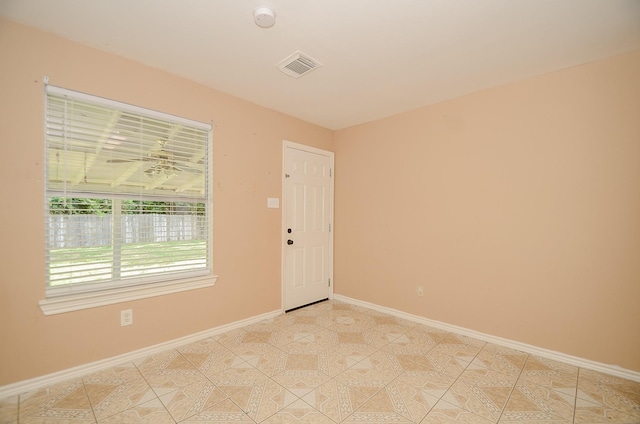 view of tiled spare room