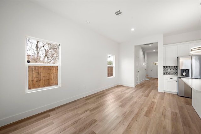 interior space with light hardwood / wood-style floors