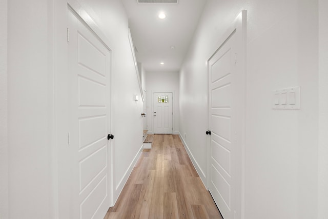 hall featuring light hardwood / wood-style flooring