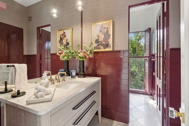 bathroom featuring tile patterned floors and vanity