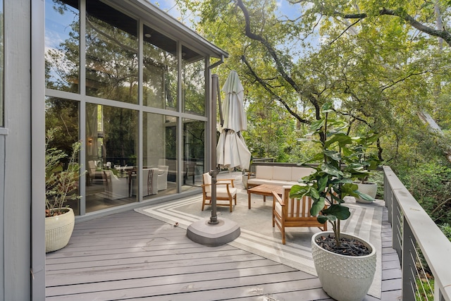 wooden deck featuring an outdoor hangout area