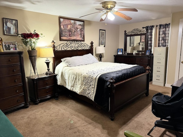 bedroom with light colored carpet and ceiling fan