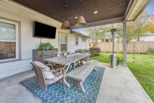 view of patio featuring ceiling fan