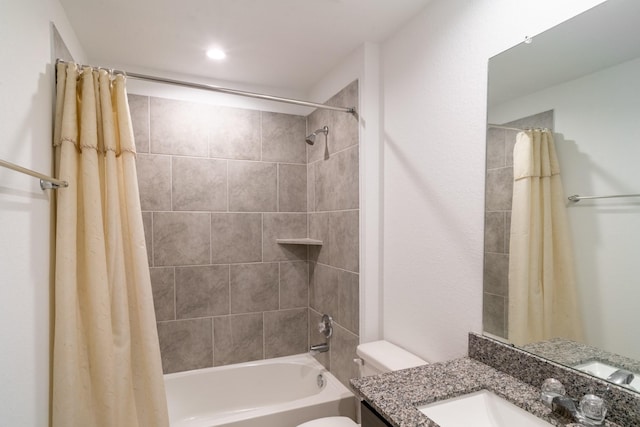 full bathroom featuring toilet, vanity, and shower / bath combo