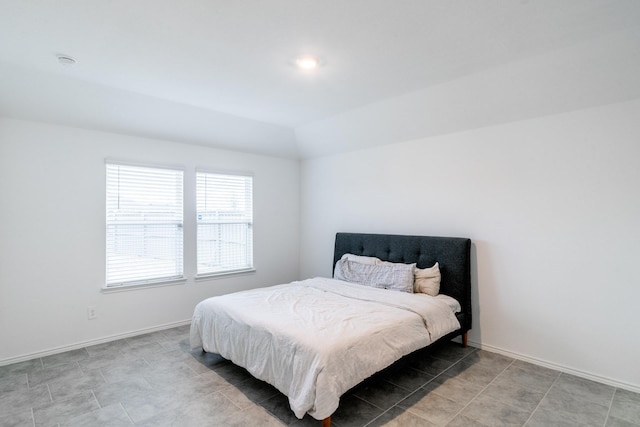 bedroom with vaulted ceiling