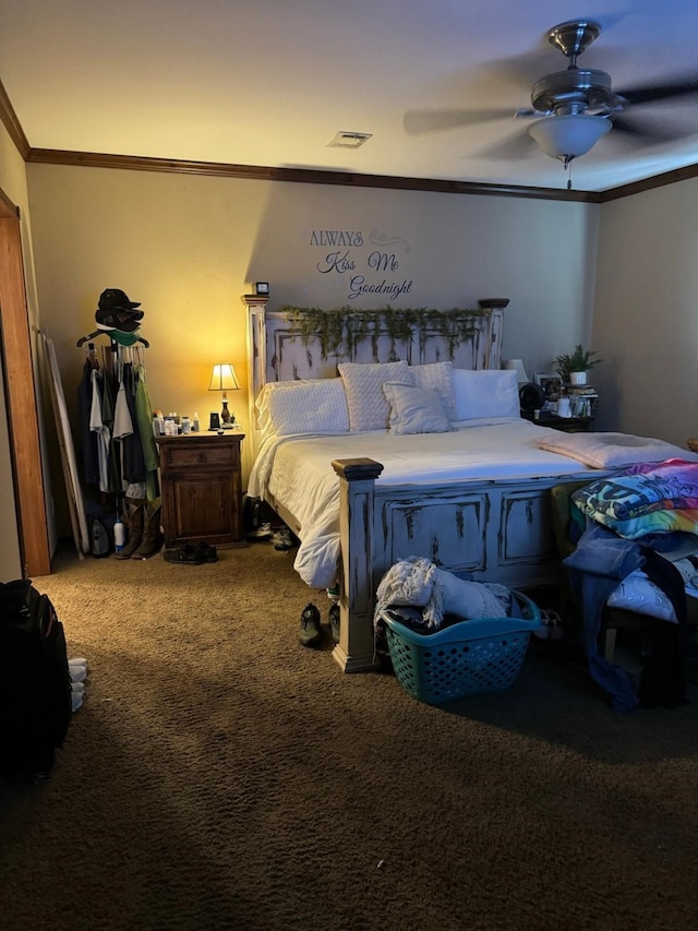 bedroom with carpet floors, ceiling fan, and ornamental molding