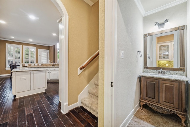 stairway with ornamental molding and sink