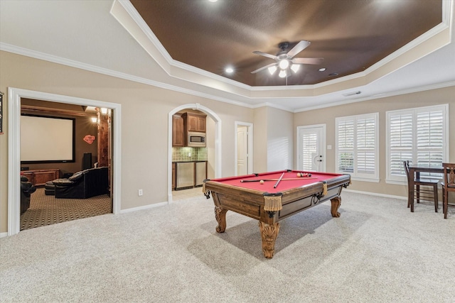 game room featuring billiards, crown molding, light carpet, and a tray ceiling