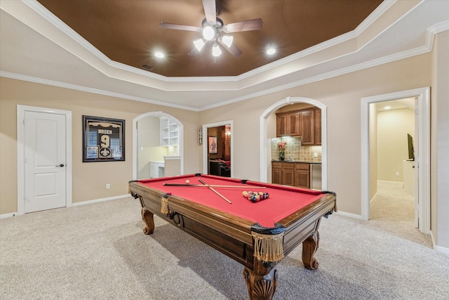 rec room featuring pool table, ceiling fan, crown molding, and a tray ceiling