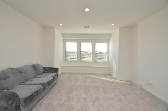 living room with light colored carpet