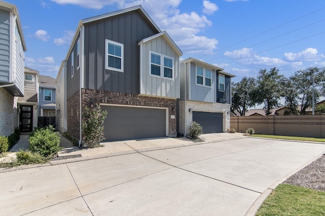 multi unit property featuring a garage