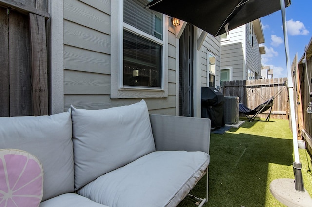 view of patio featuring area for grilling and central AC unit