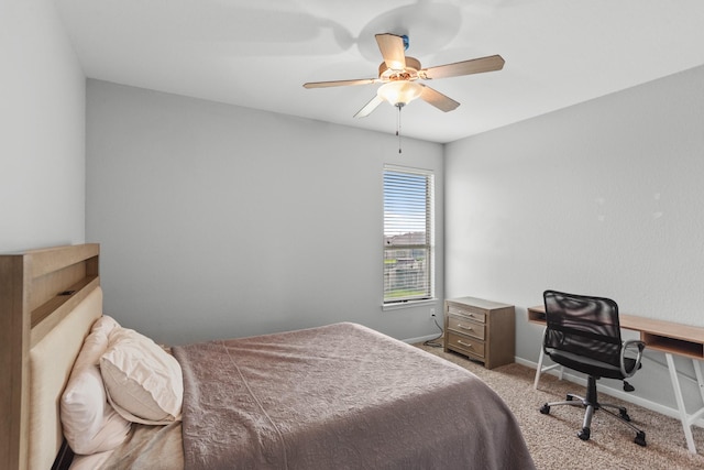 bedroom featuring light carpet and ceiling fan