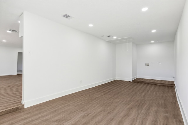 empty room with dark hardwood / wood-style floors