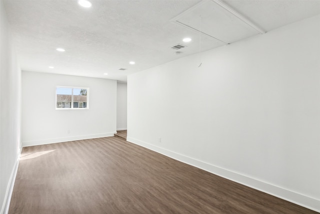 empty room featuring hardwood / wood-style floors