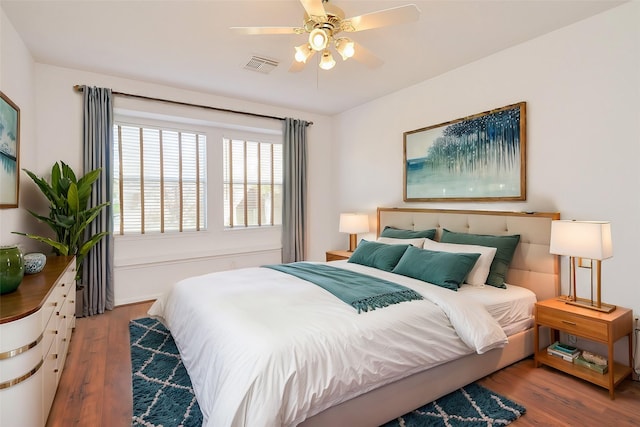 bedroom featuring ceiling fan and hardwood / wood-style floors