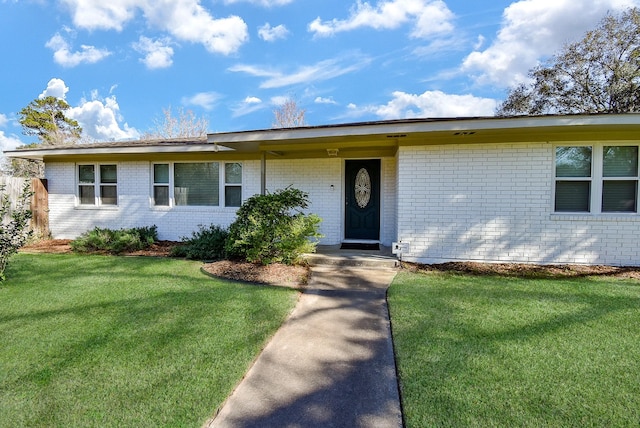 ranch-style house with a front yard