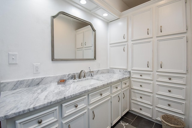 bathroom with tile patterned flooring and vanity