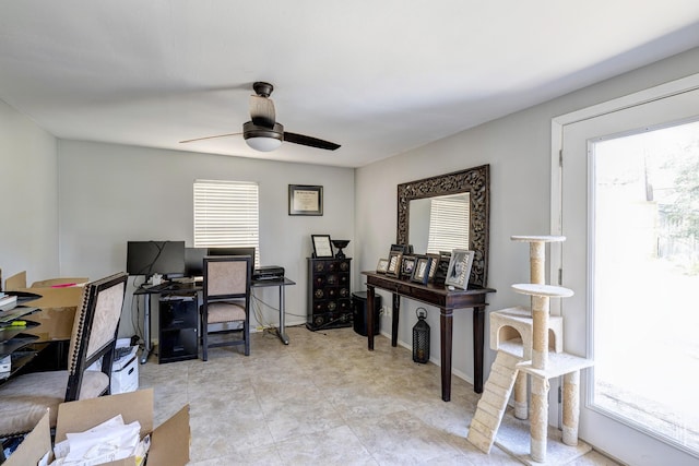 office area featuring ceiling fan and a wealth of natural light