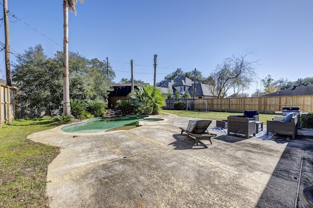 view of patio / terrace with outdoor lounge area and a fenced in pool