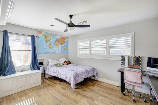 bedroom featuring ceiling fan and light hardwood / wood-style flooring