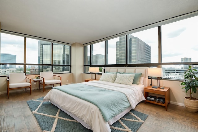 bedroom featuring hardwood / wood-style floors