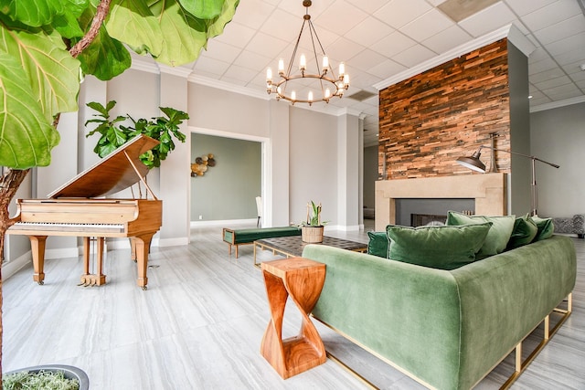 living room with a notable chandelier and crown molding